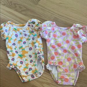 Hanna Andersson Orange and Pink Floral Bodysuits